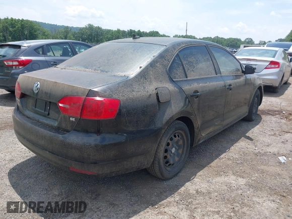 2014 Volkswagen Jetta SE with VIN 3VWD17AJ2EM392821, listed as a IAAI auction lot 42621085 with 102,211 mi miles and . Bid and sale history available at DreamBid. Image 4.
