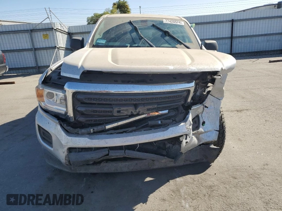 2019 GMC Canyon 2WD with VIN 1GTG5BEA1K1187730, listed as a Copart auction lot 77420574 with 103,127 mi miles and Salvage Title. Bid and sale history available at carsss.com. Image 5.