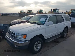 1999 Toyota 4Runner SR5 with VIN JT3GN86R5X0098655, listed as a IAAI auction lot 41783623 with 238,768 mi miles and . Bid and sale history available at DreamBid. Image 2.