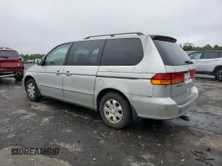 2003 Honda Odyssey EX z VIN 5FNRL18603B008148, wystawiony jako Copart lot #60669825 z przebiegiem 128 115 mil mil oraz Czysty tytuł • Clean title. Historia ofert i sprzedaży dostępna na DreamBid. Obrazek 2.