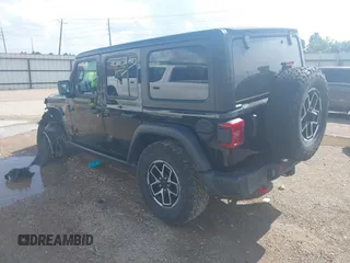 2024 Jeep Wrangler Rubicon with VIN 1C4PJXFG0RW271322, listed as a IAAI auction lot 42736647 with 32,319 mi miles and . Bid and sale history available at DreamBid. Image 3.
