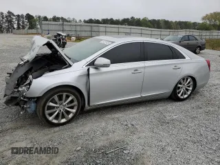 2014 Cadillac XTS Luxury z VIN 2G61M5S35E9259709, wystawiony jako Copart lot #51222425 z przebiegiem 110 081 mil mil oraz Szkody całkowita. Historia ofert i sprzedaży dostępna na DreamBid. Obrazek 1.