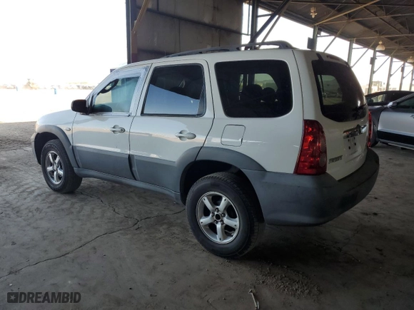 2006 Mazda Tribute i with VIN 4F2YZ02Z16KM17645, listed as a Copart auction lot 80996344 with 175,970 mi miles and Salvage Title. Bid and sale history available at carsss.com. Image 2.