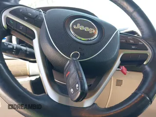 2015 Jeep Grand Cherokee Altitude with VIN 1C4RJEAG0FC952260, listed as a IAAI auction lot 41738692 with 124,197 mi miles. Bid and sale history available at carsss.com. Image 11.