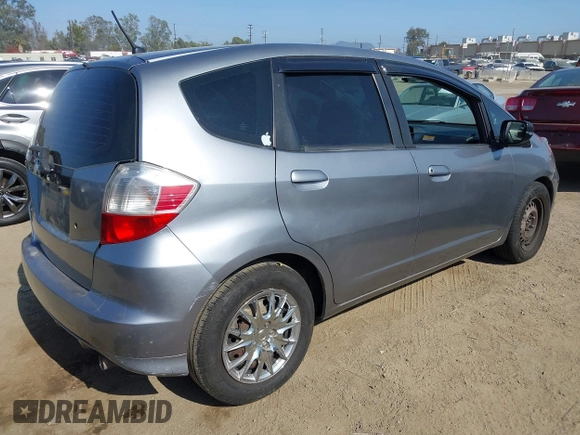 2009 Honda Fit with VIN JHMGE88239S025012, listed as a IAAI auction lot 42584028 with 163,965 mi miles and . Bid and sale history available at DreamBid. Image 4.