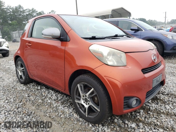 2012 Scion iQ with VIN JTNJJXB07CJ017816, listed as a Copart auction lot 59616355 with 141,384 mi miles and Salvage title. Bid and sale history available at DreamBid. Image 4.