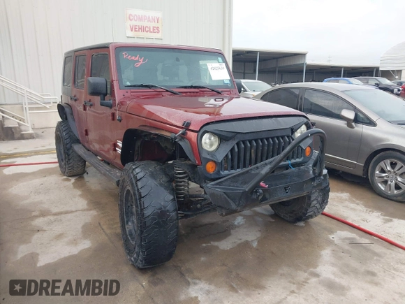 2007 Jeep Wrangler Unlimited Sahara with VIN 1J4GB59197L142223, listed as a IAAI auction lot 42025639 with 155,274 mi miles and . Bid and sale history available at DreamBid. Image 1.