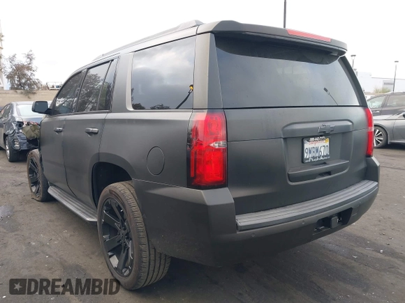 2018 Chevrolet Tahoe LT with VIN 1GNSCBKC5JR126474, listed as a IAAI auction lot 41896310 with 90,928 mi miles and . Bid and sale history available at DreamBid. Image 3.