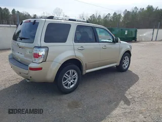 2010 Mercury Mariner Premier with VIN 4M2CN8HG4AKJ05736, listed as a IAAI auction lot 41744987 with 209,819 mi miles and . Bid and sale history available at DreamBid. Image 4.