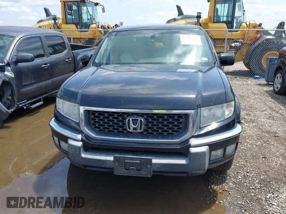 2011 Honda Ridgeline RTL with VIN 5FPYK1F54BB011472, listed as a IAAI auction lot 42112512 with 194,974 mi miles and . Bid and sale history available at DreamBid. Image 12.