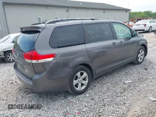 2013 Toyota Sienna LE AAS with VIN 5TDKK3DC0DS301315, listed as a IAAI auction lot 42215454 with 328,507 mi miles and . Bid and sale history available at DreamBid. Image 4.