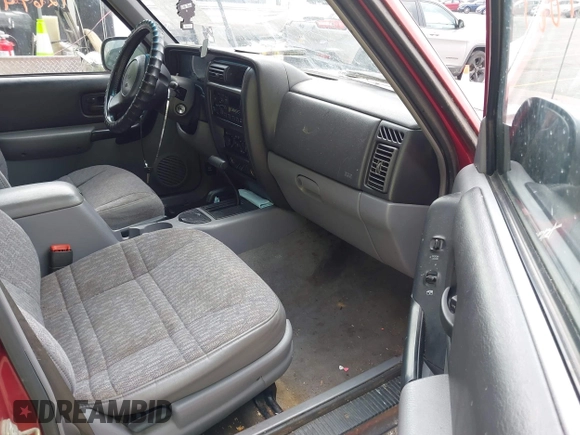 1998 Jeep Cherokee Sport with VIN 1J4FJ68S7WL192924, listed as a IAAI auction lot 42694863 with 204,565 mi miles and . Bid and sale history available at DreamBid. Image 5.