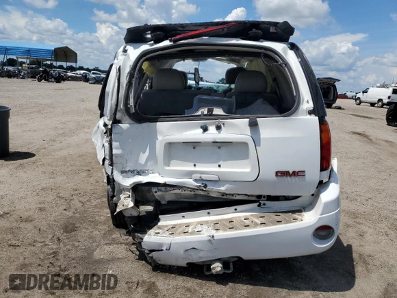 2008 GMC Envoy SLE2 with VIN 1GKDS13S382172154, listed as a Copart auction lot 61026404 with 166,182 mi miles and Salvage Title. Bid and sale history available at carsss.com. Image 6.