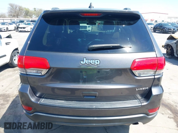 2015 Jeep Grand Cherokee Altitude with VIN 1C4RJEAG0FC952260, listed as a IAAI auction lot 41738692 with 124,197 mi miles. Bid and sale history available at carsss.com. Image 17.