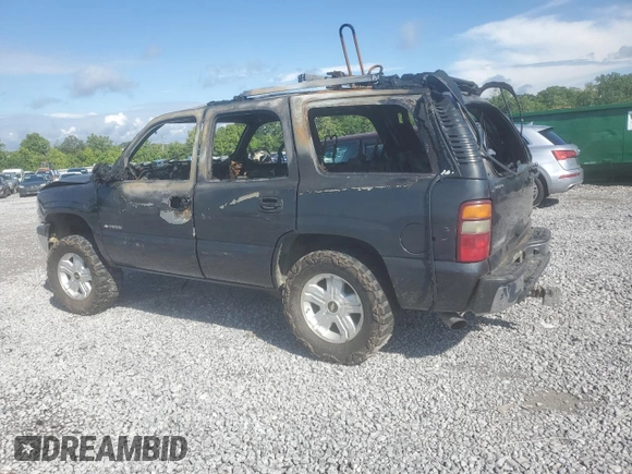 2003 Chevrolet Tahoe LS z VIN 1GNEC13Z03J273863, wystawiony jako Copart lot #56574255 z przebiegiem Nie podano mil oraz Szkoda całkowita • Salvage title. Historia ofert i sprzedaży dostępna na DreamBid. Obrazek 2.