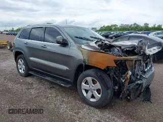 2011 Jeep Grand Cherokee Laredo z VIN 1J4RR4GG3BC718953, wystawiony jako IAAI lot #39421353 z przebiegiem Nie podano mil oraz . Historia ofert i sprzedaży dostępna na DreamBid. Obrazek 1.
