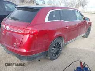 2014 Lincoln MKT EcoBoost with VIN 2LMHJ5ATXEBL58430, listed as a IAAI auction lot 41657571 with 58,502 mi miles and . Bid and sale history available at DreamBid. Image 4.