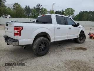 2018 Ford F-150 XL with VIN 1FTEW1C53JKC18828, listed as a Copart auction lot 50357415 with 128,689 mi miles and Salvage Title. Bid and sale history available at DreamBid. Image 3.