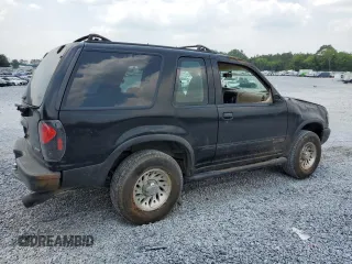 2000 Ford Explorer Sport with VIN 1FMYU60E8YUB03494, listed as a Copart auction lot 59266395 with 210,925 mi miles and Salvage title. Bid and sale history available at DreamBid. Image 3.