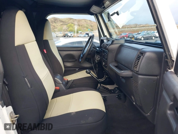 2001 Jeep Wrangler Sport with VIN 1J4FA49S41P308407, listed as a IAAI auction lot 41772240 with 139,461 mi miles. Bid and sale history available at carsss.com. Image 5.