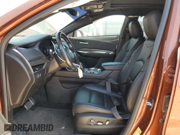 2019 Cadillac XT4 AWD Sport with VIN 1GYFZFR42KF136567, listed as a Copart auction lot 52018445 with 99,944 mi miles and Salvage title. Bid and sale history available at DreamBid. Image 7.