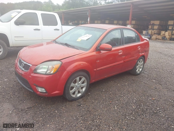 2011 Kia Rio LX with VIN KNADH4A33B6714471, listed as a IAAI auction lot 41970737 with 188,214 mi miles. Bid and sale history available at carsss.com. Image 2.