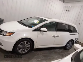 2015 Honda Odyssey Touring Elite with VIN 5FNRL5H92FB020159, listed as a IAAI auction lot 42103240 with 79,322 mi miles and . Bid and sale history available at DreamBid. Image 15.