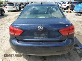 2013 Volkswagen Passat SE with VIN 1VWBP7A35DC087692, listed as a Copart auction lot 62236985 with 195,921 mi miles and Salvage title. Bid and sale history available at DreamBid. Image 6.