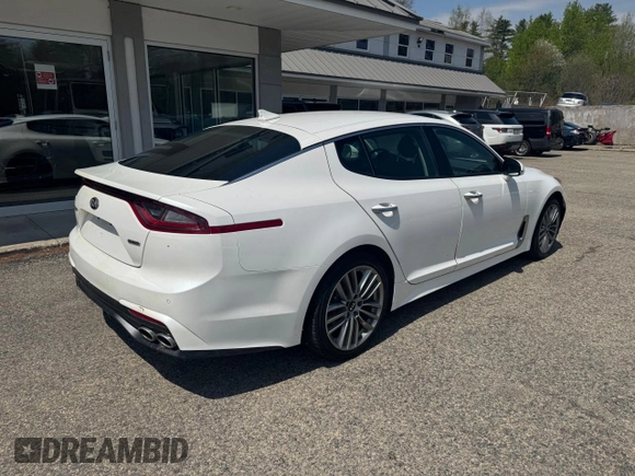 2018 Kia Stinger with VIN KNAE15LA7J6031245, listed as a Copart auction lot 55879285 with 144,020 mi miles and Clean Title. Bid and sale history available at carsss.com. Image 4.