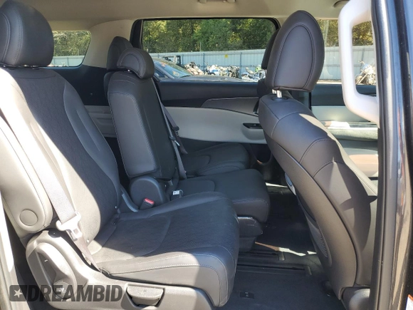 2023 Kia Carnival LX with VIN KNDNB4H37P6249098, listed as a Copart auction lot 76751724 with 26,992 mi miles and Salvage Title. Bid and sale history available at carsss.com. Image 11.