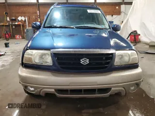 2002 Suzuki Grand Vitara JLX z VIN JS3TD62V524160739, wystawiony jako Copart lot #88416995 z przebiegiem 98 820 mil mil oraz Szkoda całkowita • Salvage title. Historia ofert i sprzedaży dostępna na DreamBid. Obrazek 5.