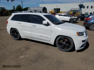 2015 Jeep Grand Cherokee Summit with VIN 1C4RJFJM3FC731831, listed as a Copart auction lot 66570534 with 230,193 mi miles and Clean Title. Bid and sale history available at carsss.com. Image 4.
