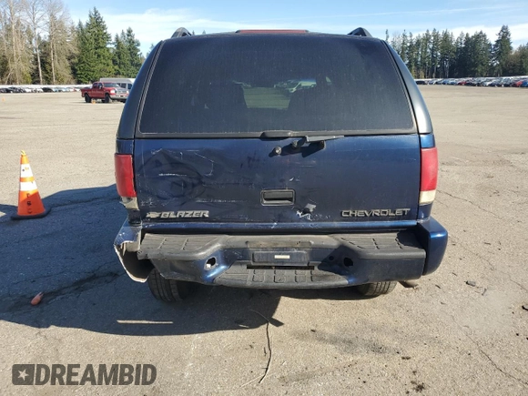 2000 Chevrolet Blazer LT z VIN 1GNDT13W8Y2119632, wystawiony jako Copart lot #47387175 z przebiegiem 140 356 mil mil oraz Szkoda całkowita • Salvage title. Historia ofert i sprzedaży dostępna na DreamBid. Obrazek 6.