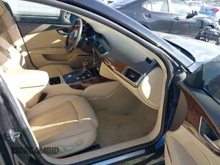 2013 Audi A7 3.0 Prestige with VIN WAU2GAFC2DN065112, listed as a IAAI auction lot 41117426 with 159,105 mi miles. Bid and sale history available at carsss.com. Image 5.