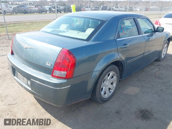 2005 Chrysler 300 with VIN 2C3JA53G35H157178, listed as a IAAI auction lot 41849007 with 149,247 mi miles. Bid and sale history available at carsss.com. Image 4.