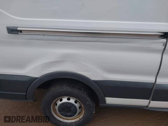 2015 Ford Transit Cargo with VIN 1FTNR2XG6FKB09053, listed as a IAAI auction lot 41486394 with 175,265 mi miles and . Bid and sale history available at DreamBid. Image 17.