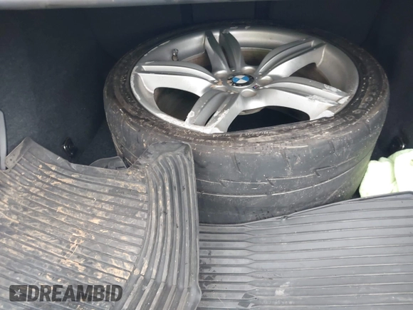 2014 BMW 5 Series 535d with VIN WBAXA5C58ED690612, listed as a IAAI auction lot 41570616 with 95,124 mi miles and . Bid and sale history available at carsss.com. Image 12.