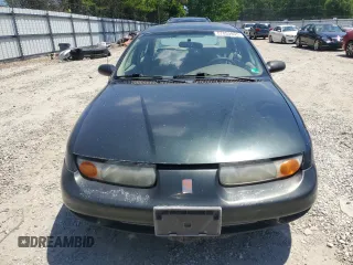 2002 Saturn SL с VIN 1G8ZK52732Z230147, выставлен на аукционе Copart как лот 57053055 с пробегом 168 612 миль миль и Чистый • Clean title. История ставок и продаж доступна на DreamBid. Изображение 5.