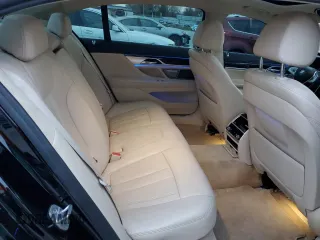 2018 BMW 7 Series 740i xDrive with VIN WBA7E4C50JGV23975, listed as a Copart auction lot 82354264 with 63,657 mi miles and Salvage Title. Bid and sale history available at carsss.com. Image 10.