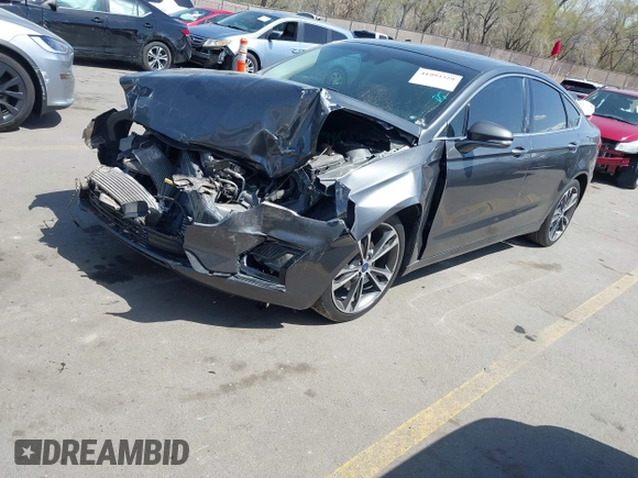 2019 Ford Fusion Titanium with VIN 3FA6P0D90KR109985, listed as a IAAI auction lot 41993329 with Not provided miles and . Bid and sale history available at DreamBid. Image 2.