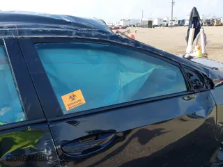 2019 Toyota Corolla L with VIN 5YFBURHE2KP935806, listed as a IAAI auction lot 41673090 with 61,926 mi miles. Bid and sale history available at carsss.com. Image 5.