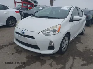 2014 Toyota Prius One with VIN JTDKDTB37E1559827, listed as a IAAI auction lot 42100986 with 44,155 mi miles and . Bid and sale history available at DreamBid. Image 2.