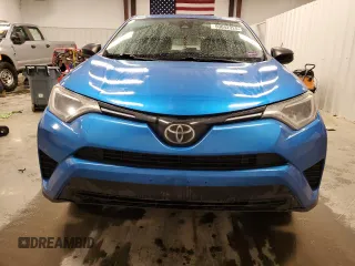 2018 Toyota RAV4 LE with VIN JTMBFREV9JJ197097, listed as a Copart auction lot 50042325 with 167,978 mi miles and Salvage Title. Bid and sale history available at DreamBid. Image 5.