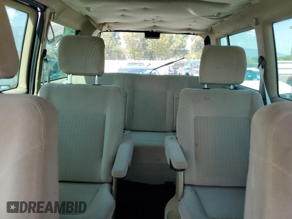 2003 Volkswagen EuroVan с VIN WV2KB47043H001319, выставлен на аукционе Copart как лот 73758024 с пробегом 88 497 миль миль и Чистый • Clean title. История ставок и продаж доступна на DreamBid. Изображение 10.