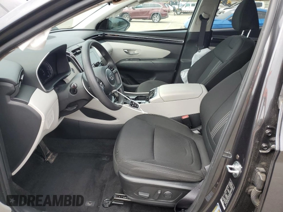 2023 Hyundai Tucson SEL with VIN 5NMJBCAE3PH261921, listed as a Copart auction lot 52076995 with 19,558 mi miles and Salvage Title. Bid and sale history available at DreamBid. Image 7.