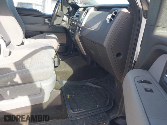 2012 Ford F-150 XL with VIN 1FTFW1CF9CFA94640, listed as a IAAI auction lot 41703729 with 216,291 mi miles. Bid and sale history available at carsss.com. Image 5.
