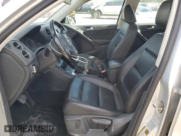 2017 Volkswagen Tiguan S with VIN WVGAV7AX1HK026998, listed as a Copart auction lot 74959504 with 93,696 mi miles and Salvage Title. Bid and sale history available at DreamBid. Image 7.