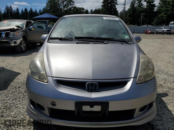 2007 Honda Fit Sport with VIN JHMGD37617S043208, listed as a Copart auction lot 64594825 with 210,672 mi miles and Clean title. Bid and sale history available at DreamBid. Image 5.