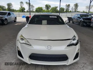 2013 Scion FR-S z VIN JF1ZNAA10D2724258, wystawiony jako Copart lot #60417725 z przebiegiem 138 315 mil mil oraz Czysty tytuł • Clean title. Historia ofert i sprzedaży dostępna na DreamBid. Obrazek 5.