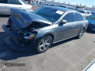 2013 Volkswagen Passat SE w/Sunroof with VIN 1VWBP7A35DC112333, listed as a IAAI auction lot 41718676 with 105,110 mi miles. Bid and sale history available at carsss.com. Image 2.